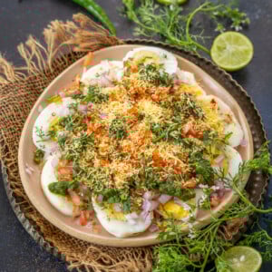Egg Chaat is a healthy snack or appetizer that can be made quickly using a few simple ingredients. Here is how to make it.