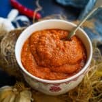 Make this spicy, garlicky, and tangy Nandos copycat Peri Peri Sauce (Piri Piri Sauce) at home using simple ingredients in under 30 minutes. It's vegan and gluten-free too.
