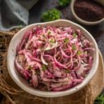 These 5-minute Sumac Onions are a Turkish-style onion salad or a pickle that adds a nice crunch to anything it's added to. Use this red onion salad in sandwiches, soups, or hamburgers to add a lovely flavor and a nice crunch to them (vegan, gluten-free).
