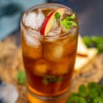 Apple iced tea served in a glass.
