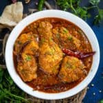 Chicken Masala Curry is a bold, spicy, and super flavorful Indian chicken curry made by cooking chicken in an onion tomato-based gravy. Make it in restaurant style using my easy recipe (gluten-free).