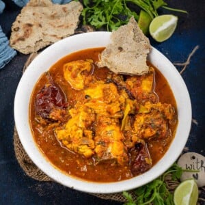 Bold, spicy, and full of flavors, chicken masala is a delicious Indian chicken curry, where marinated chicken is cooked in tomato-onion gravy. Make it in an instant pot, traditional pressure cooker, or in a pot over the stovetop using my easy recipe.