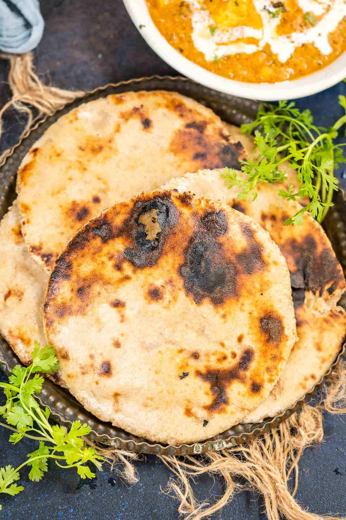 Khamiri roti served on a plate.