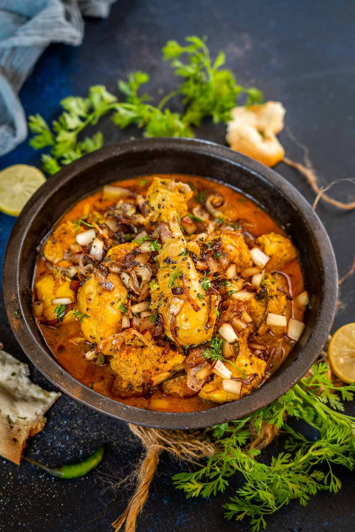 Malabar chicken curry served in a bowl.