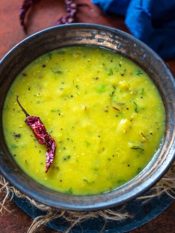 Make this Bengali Masoor Dal for a comforting meal and serve it with steamed rice and a dry sabji on the side. Here is how to make it (vegan, gluten-free).