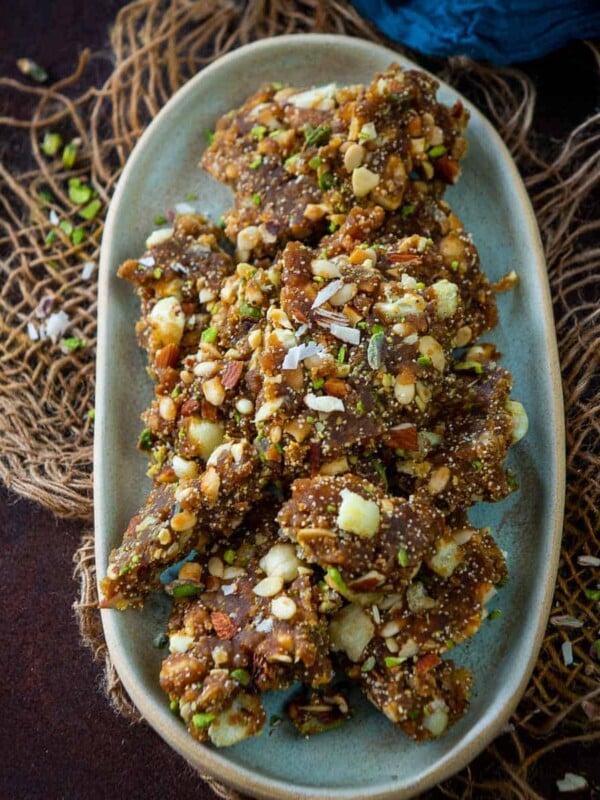 Masala Gur is nothing but jaggery mixed with nuts and spices. It is a delicious and very healthy sweet treat to eat during winters. Check out my perfect recipe to make it at home.