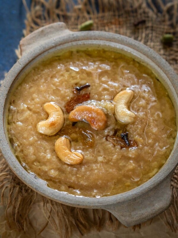 Sakkarai Pongal (Chakkara Pongal) is a sweet South Indian traditional sweet porridge-like dish made using rice, lentils, and jaggery. Use my easy recipe to make it in a stovetop pressure or an instant pot.