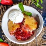 This Easy Homemade Strawberry Cobbler comes together using simple ingredients in under 10 minutes of active working time. Make it for a get-together, house party, or after-meal dessert.