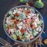 This crunchy and creamy Amish Broccoli Salad with Bacon is easy to make and comes together quickly. It's a great make-ahead salad, perfect for get-togethers, potlucks, and picnics (gluten-free).