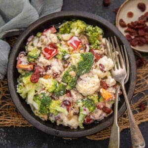 This crunchy and creamy Amish Broccoli Salad is super easy to make and comes together in under 10 minutes. It's a great make-ahead salad that is perfect to make for get-togethers, potlucks, and picnics.