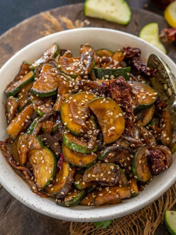 Make this quick and easy Chinese Zucchini Stir Fry in under 15 minutes. It is a great healthy side dish that goes well with any meal (vegan, keto, and can be easily made gluten-free).