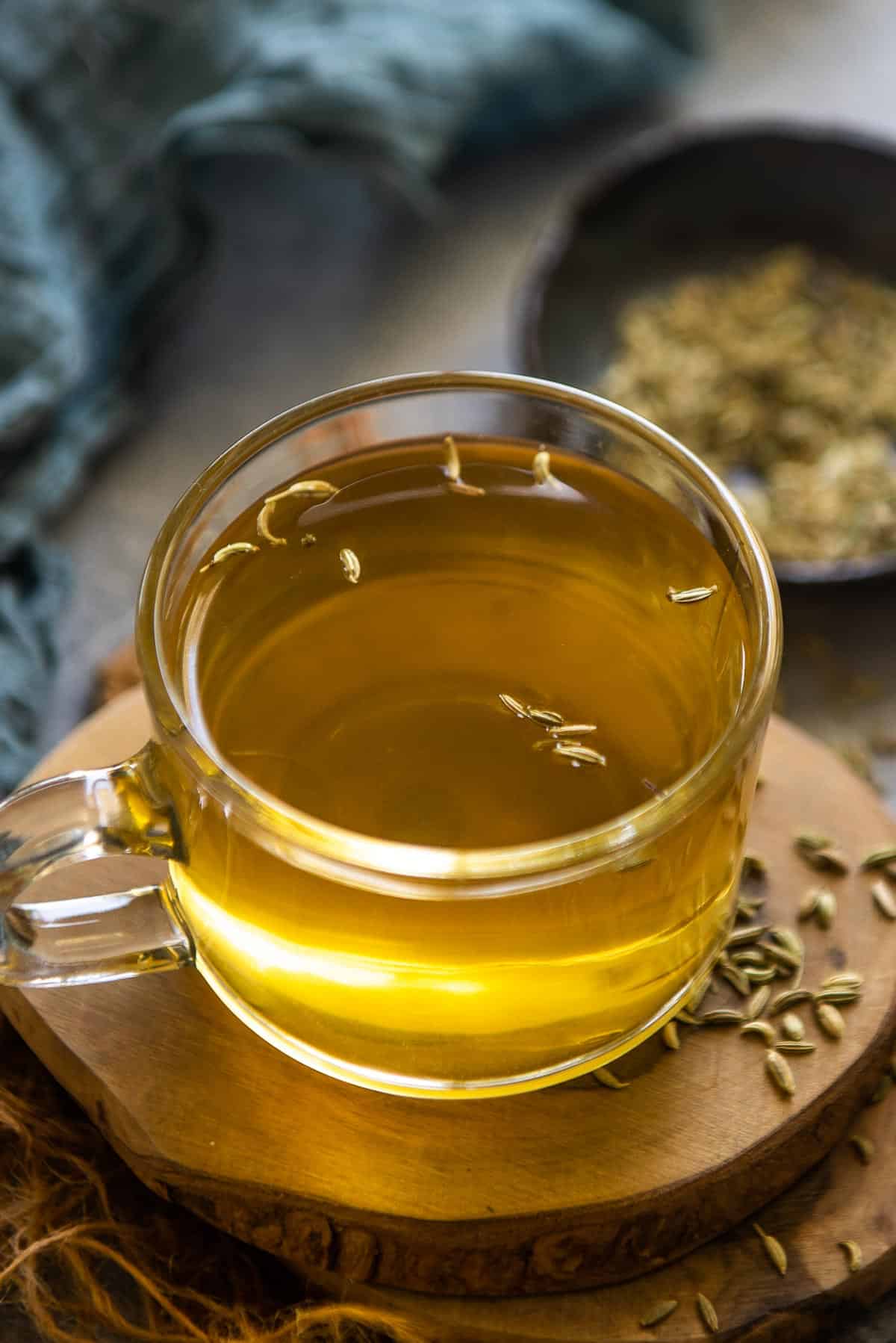 A healthy tea served in a glass cup