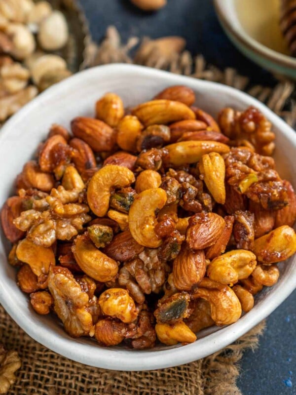 These crunchy, sweet and nutty Honey Roasted Mixed Nuts are the perfect healthy snack to munch on whenever hunger strikes. These come together quickly using simple ingredients (vegetarian, gluten-free)