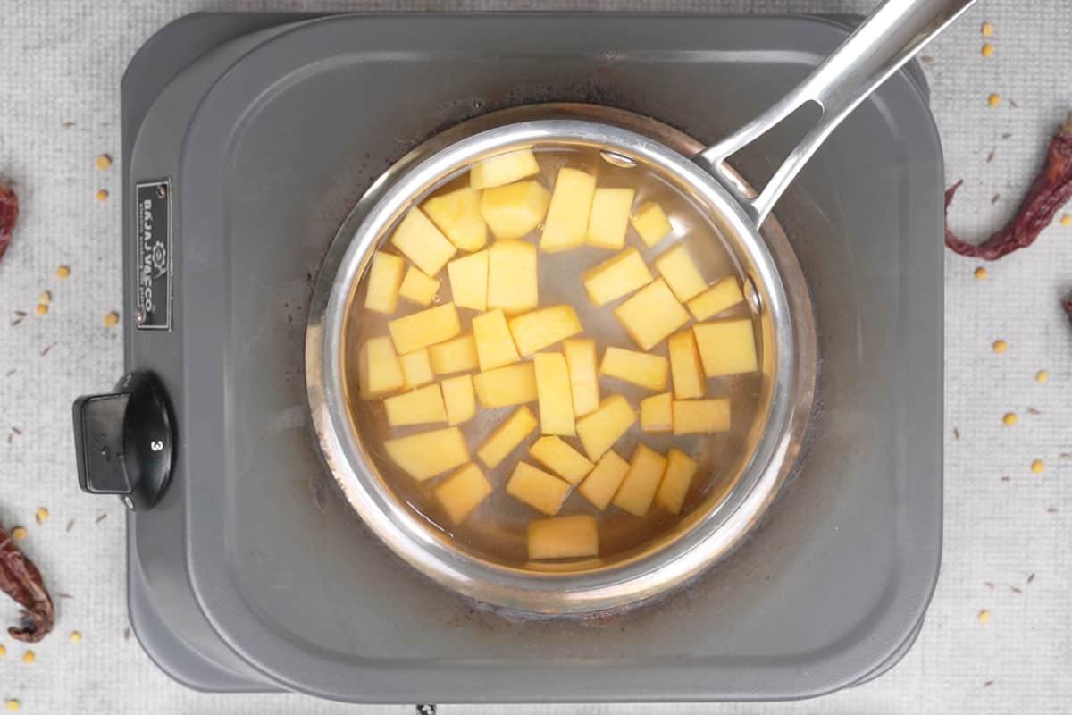 Pumpkin added to boiling water.