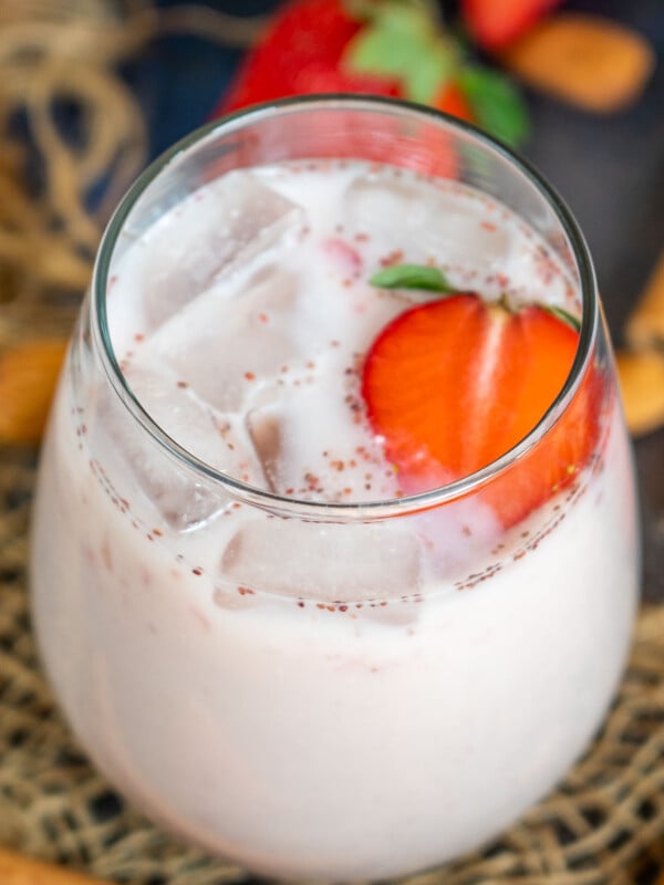 This Easy Strawberry Horchata (Pink Horchata) is a fun twist on the classic Spanish beverage. Make this lightly sweet, no-cook, rich, and creamy drink for a refreshing summer treat (vegetarian, gluten-free).