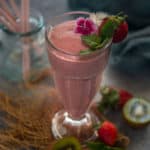 Loaded with vitamins and fiber, this 5-minute tropical Strawberry Banana Kiwi Smoothie is a perfect breakfast for your busy summer mornings. It is healthy, quick, creamy, and great for building body immunity (vegetarian, gluten-free).