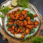 Chicken pakora served on a plate.