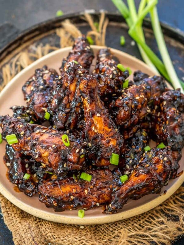Make these super addictive Korean Gochujang Chicken Wings for game day or as a party appetizer. It is a bomb combination of sweet, spicy, and umami flavors and will make you want more and more once you try it. Make this recipe in an oven or an air fryer.