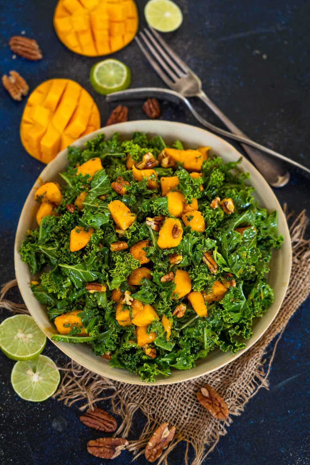 Kale Mango Salad served on a large plate.