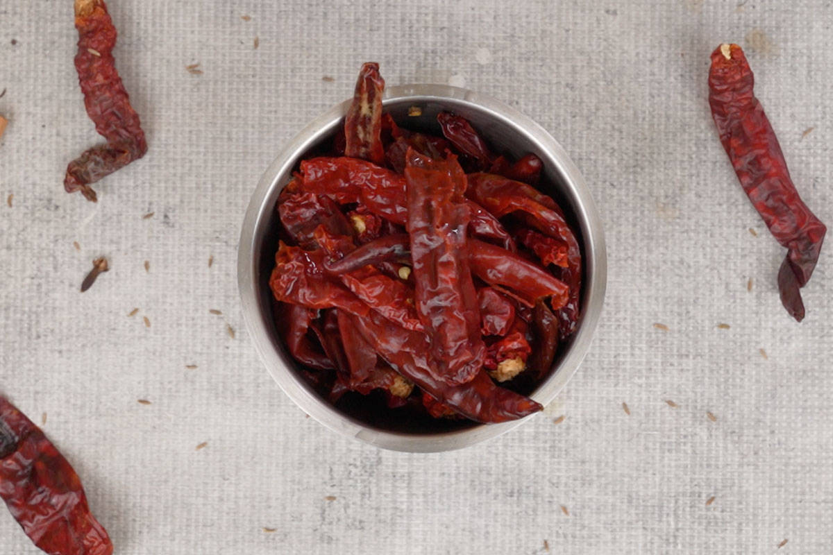 Soaked chilies and water added to a blender.