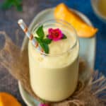 Are you looking for a quick and healthy breakfast to kick-start your day? Then try this thick and creamy Mango Banana Smoothie, which will get ready in under 10 minutes (vegetarian, gluten-free, and can be made vegan).