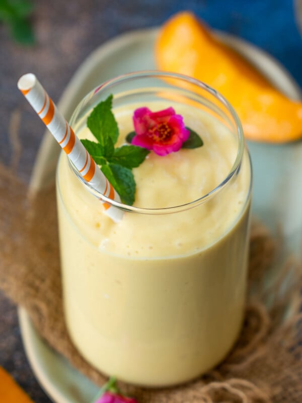 Are you looking for a quick and healthy breakfast to kick-start your day? Then try this thick and creamy Mango Banana Smoothie, which will get ready in under 10 minutes (vegetarian, gluten-free, and can be made vegan).