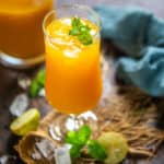 This super easy and refreshing Iced Mango Green Tea is a perfect summer beverage. Make a big pitcher using fresh or frozen mangoes and serve for picnics, BBQ, or summer lunches (vegan, gluten-free, dairy-free).