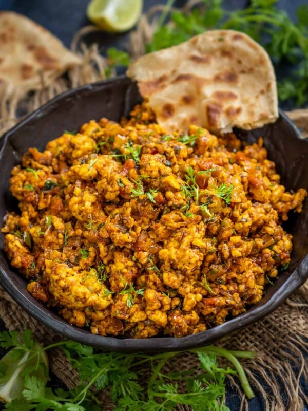 Dry Paneer Bhurji is a North Indian style stir fry made using Indian cottage cheese (paneer), onions, tomatoes, and spices. Make this protein-rich sabji in under 20 minutes and serve it for breakfast, lunch, or dinner.