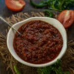 Make this spicy, Sweet Tomato Chutney (Tamatar Ki Meethi Chutney) using pantry staples in under 20 minutes. This Indian accompaniment pairs well with any Indian meal (vegan, can be made gluten-free).