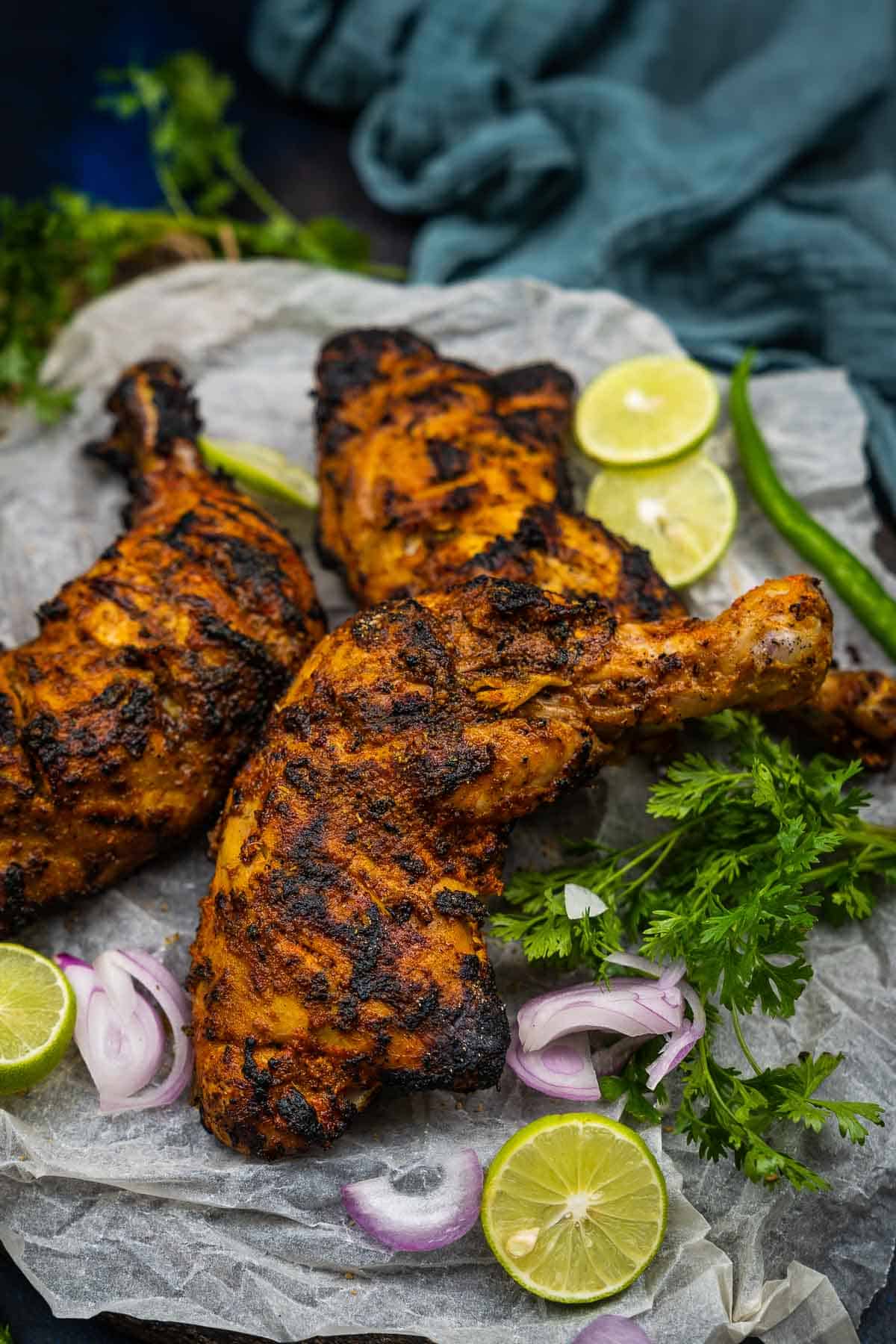 Tandoori chicken served on a plate.