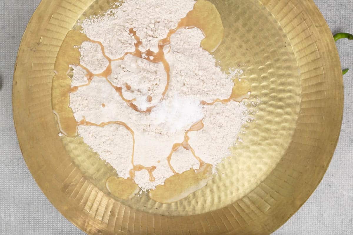 Flour, salt and oil added to a large bowl.