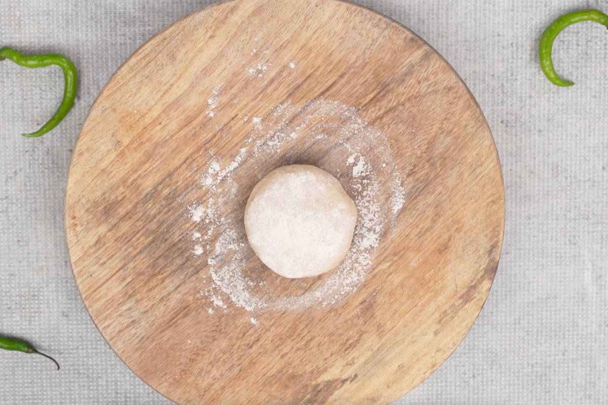 Dough ball dusted with flour.