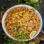 Bhel Puri is a popular Indian street-style snack made using puffed rice as its base ingredient. This tangy, spicy, and slightly sweet chaat can be made in just 10 minutes if you have the ingredients ready. Here is my easy recipe to make at home (vegan, low-cal).