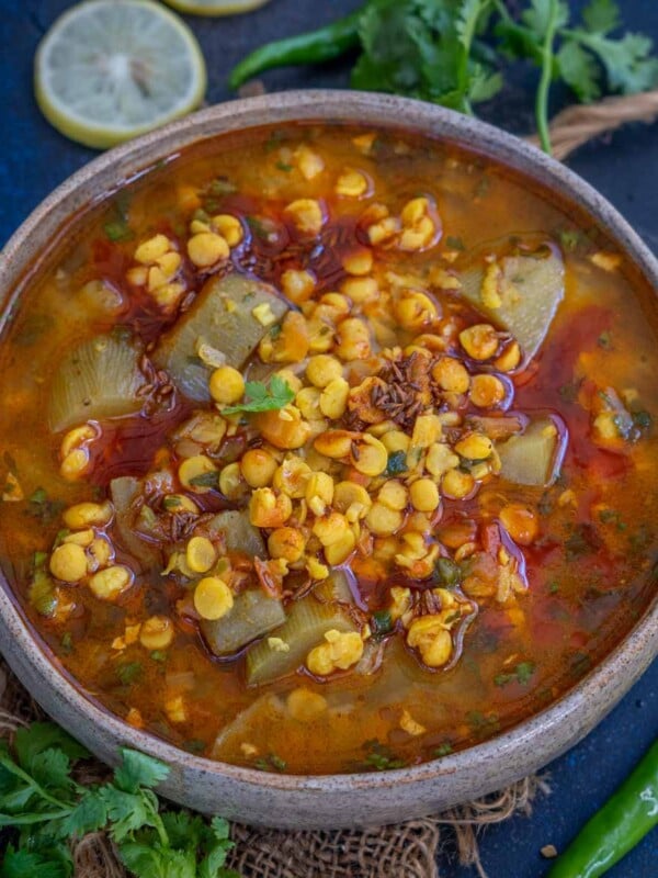 Lauki Chana Dal is a delicious and nutritious combination of lauki (bottle gourd), chana dal (Bengal gram lentil), and a few spices. Make this Indian lentil curry for your everyday meals and serve it with rice or roti (vegetarian, can be easily made vegan and gluten-free).