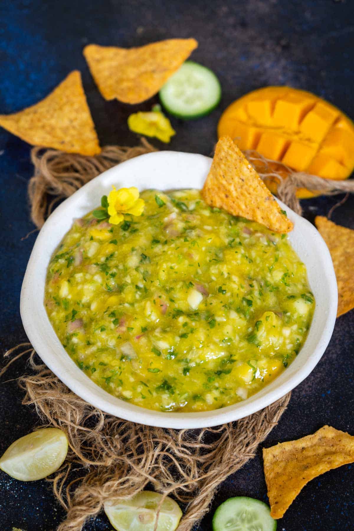 Mango cucumber salsa served in a bowl.