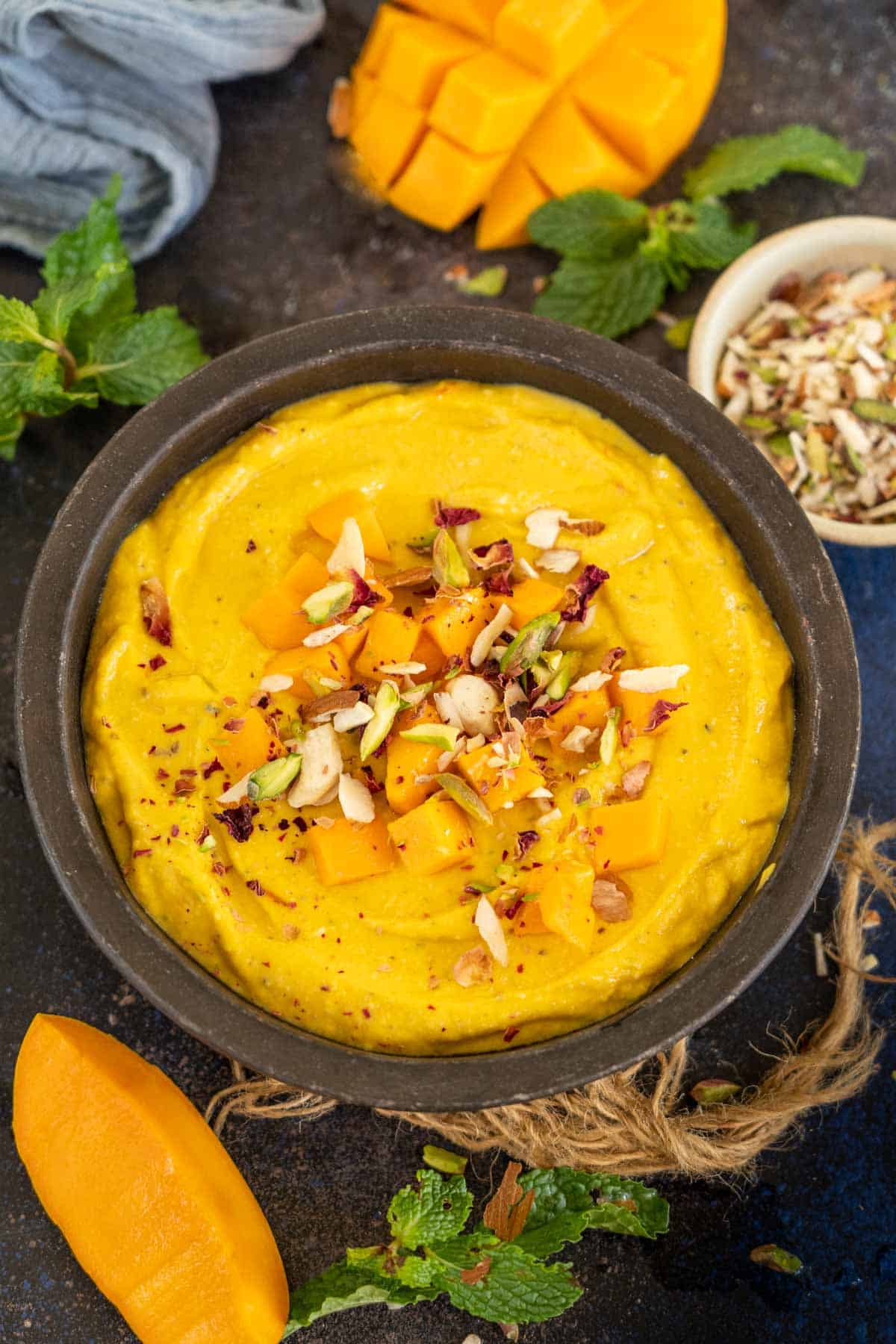 Mango shrikhand served in a bowl.