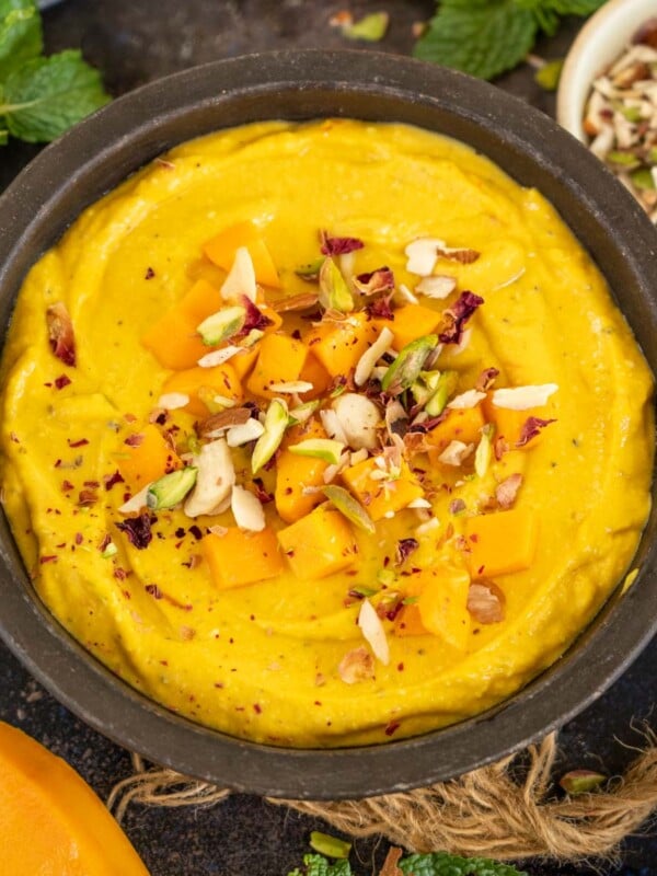 Mango Shrikhand (Amrakhand) is a popular Indian dessert recipe made using yogurt and mango puree. It is a delicious and refreshing variation of the classic shrikhand. Here is how to make it.