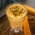 Muskmelon punch is a creamy cooling drink made using muskmelon, milk, condensed milk, and nuts. Serve it as a snack or dessert. Here is how to make it.
