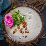 Bored of your usual raita recipes? Then try this Sprouted Chickpea Raita to serve with your Indian meals. It is easy, protein-rich, and a perfect accompaniment for your summer meals. Here is how to make it (vegetarian, gluten-free).