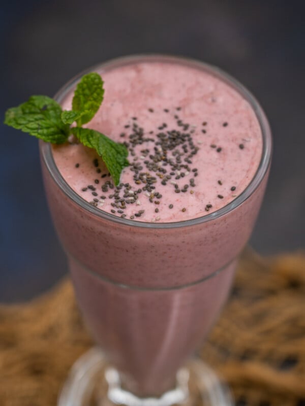 Strawberry Chia Seed Smoothie is a delicious protein-loaded breakfast option that is perfect to start your day. It is easy and quick to make and keeps you full for a long time (vegan, gluten-free).