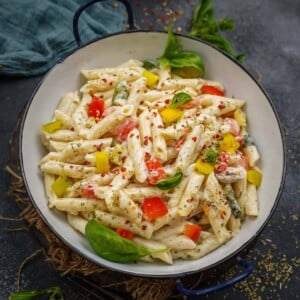 Make this creamy white sauce pasta or bechamel sauce pasta from scratch in just 30 minutes. It makes for a perfect lazy dinner and is really popular among kids. Here is how to make it at home.