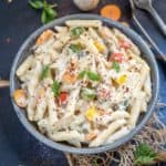 Make this creamy White Sauce Pasta (Bechamel Sauce Pasta) from scratch in just 30 minutes. It makes for a perfect lazy dinner and is really popular among kids.
