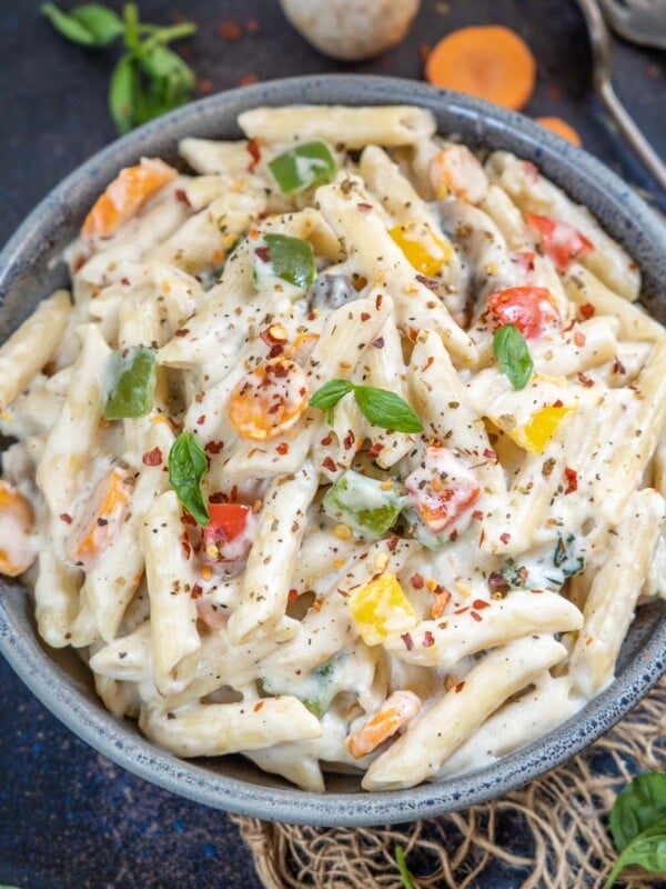 Make this creamy White Sauce Pasta (Bechamel Sauce Pasta) from scratch in just 30 minutes. It makes for a perfect lazy dinner and is really popular among kids.