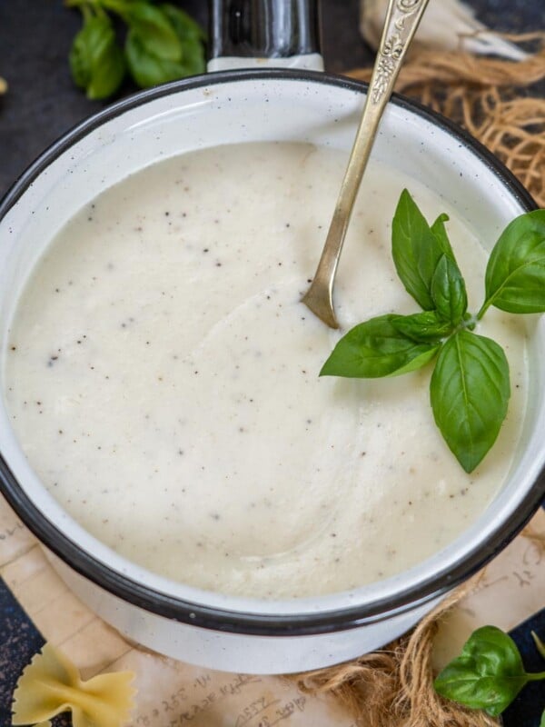 Learn how to make Classic Bechamel Sauce (White Sauce) at home using my super simple recipe. One of the classic French mother sauces, this perfectly smooth and creamy white sauce is great for making casseroles, souffles, and pasta dishes.