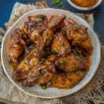 Made using just 3 ingredients, these juicy and crispy Wingstop Copycat Cajun Chicken Wings are going to be a sure-shot hit at your next house party! Make them in an oven or an air fryer.
