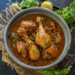 Make this Indian country-style Desi Chicken Curry at home using my easy recipe. Serve it with roti or rice for a hearty meal (gluten-free).