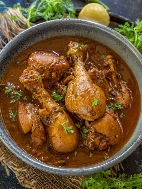 Make this Indian country-style Desi Chicken Curry at home using my easy recipe. Serve it with roti or rice for a hearty meal (gluten-free).