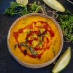 Green Mango Kadhi (Raw Mango Kadhi) is a delicious twist on the classic kadhi recipe where tangy green mangoes are added to it. It comes together in under 30 minutes using simple ingredients.