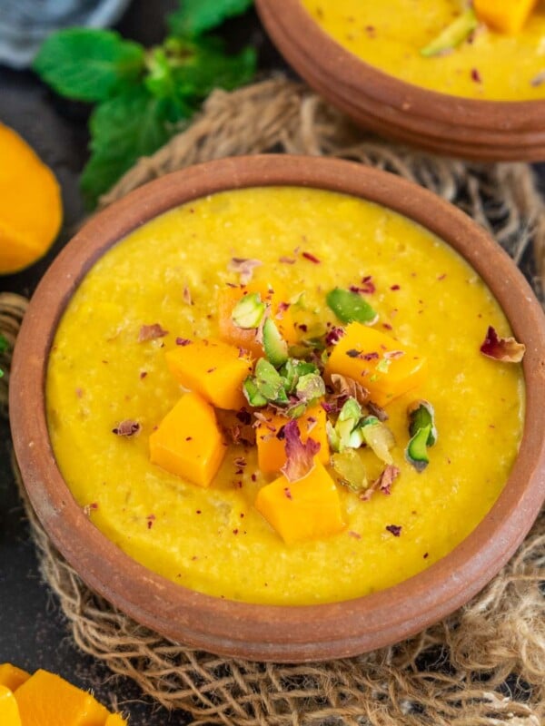 Mango Phirni (Indian Rice Pudding with Mangoes) is a delicious fruity twist on the classic Phirni recipe. A beautiful combination of rice, milk, and mangoes, this Indian dessert is a must-try in summers.