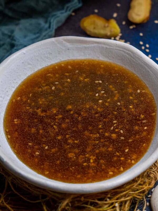 Give your salads an Asian twist with this easy homemade Sesame Ginger Dressing! It comes together in just 5 minutes (Vegan, Can be easily made Gluten-Free).